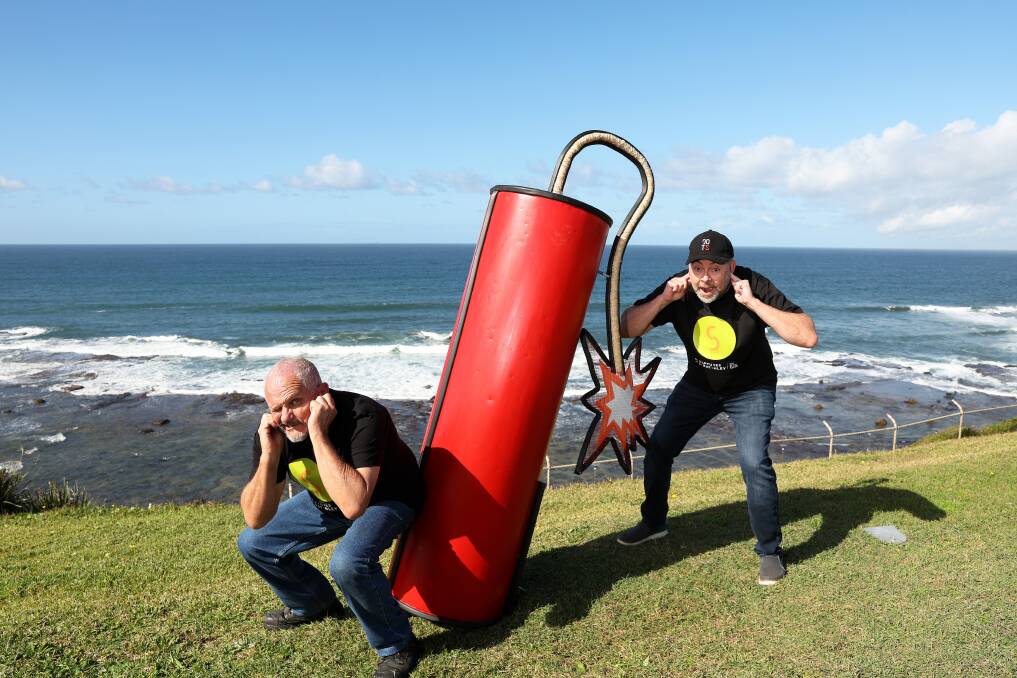 Sculptures at Scratchley founder Grahame Wilson and Out of the Square media boss Marty Adnum with 'In Hot Water', one of more than 150 sculptures on exhibition at Fort Scracthley for the next fortnight. Picture by Peter Lorimer.