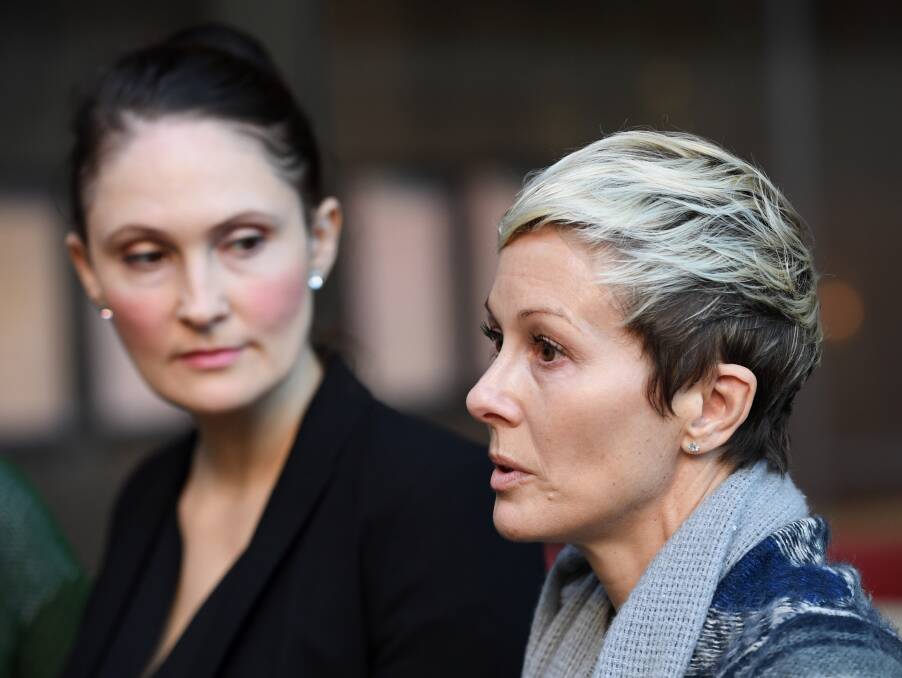 Court: Pelvic mesh victim Joanne Manion and lawyer Rebecca Jancauskas outside the Federal Court in Sydney where more than 700 women are suing Johnson & Johnson following pelvic mesh surgery. 