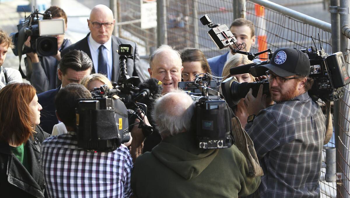 Guilty: Adelaide Archbishop Philip Wilson leaves Newcastle Local Court on Tuesday after Magistrate Robert Stone found him guilty of concealing the child sex crimes of Maitland-Newcastle priest Jim Fletcher.