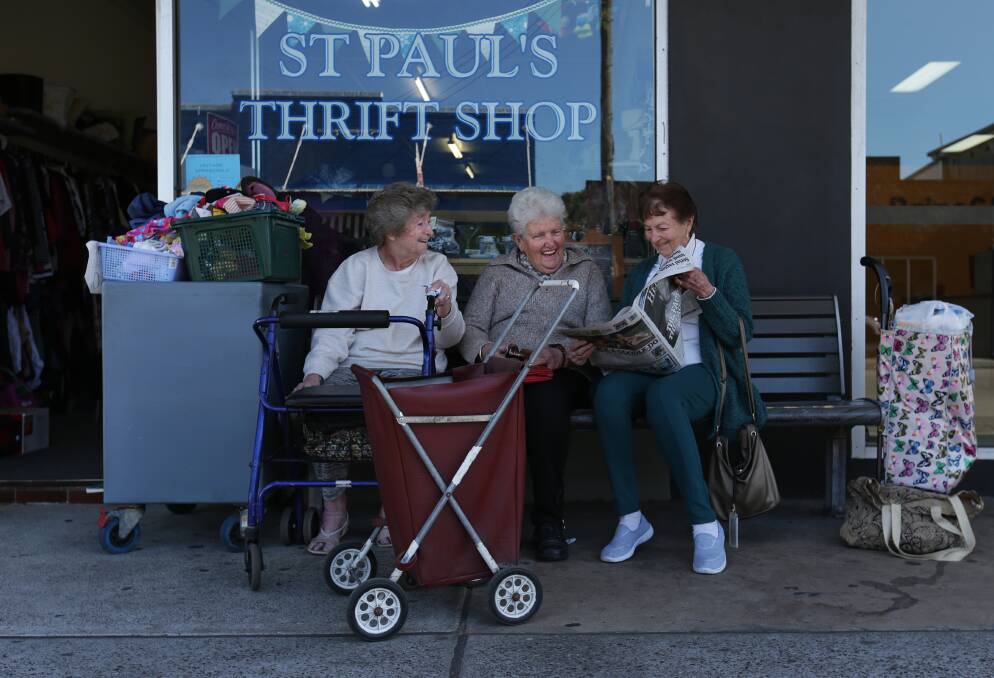 Stockton residents enjoying a chat in Mitchell Street. Picture: Simone De Peak 