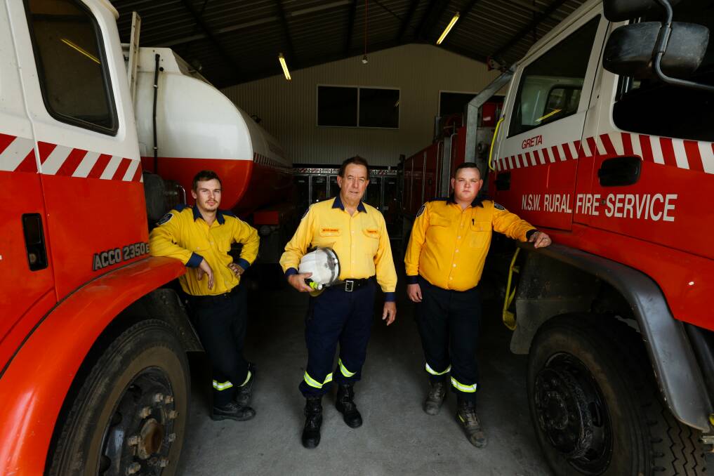 PREPARED: Greta Rural Fire Brigade members Josh Fraser, Trevor Kedwell and Lachlan Martin. Picture: Jonathan Carroll 