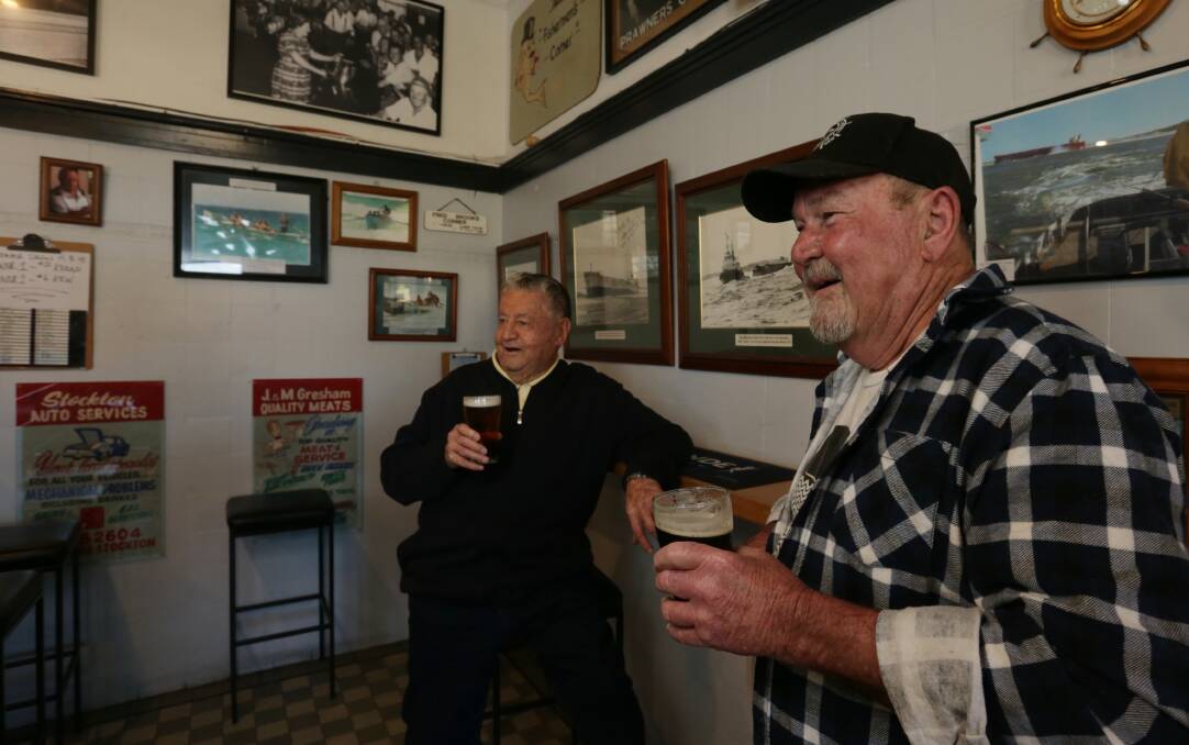 Stocktonians and former vehicular ferry workers Allan Linstrom and Doug Conway in the Boatrowers Hotel. Picture: Simone De Peak