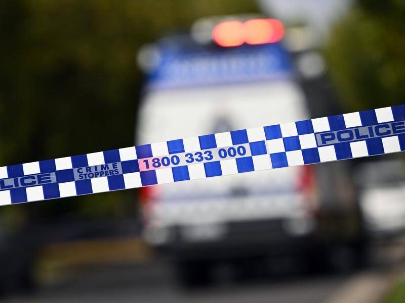 Police have cordoned off a crash scene at Bochara in Victoria's west after four people were killed. (Joel Carrett/AAP PHOTOS)