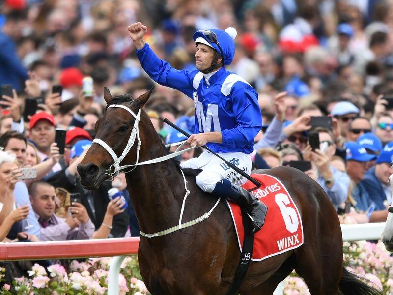 Jockey Hugh Bowman has helped Winx to a record fourth Cox Plate at Moonee Valley.