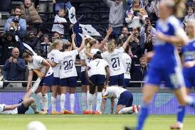 Tottenham's players celebrating their winner as they booked a place in the Women's FA Cup final. (AP PHOTO)