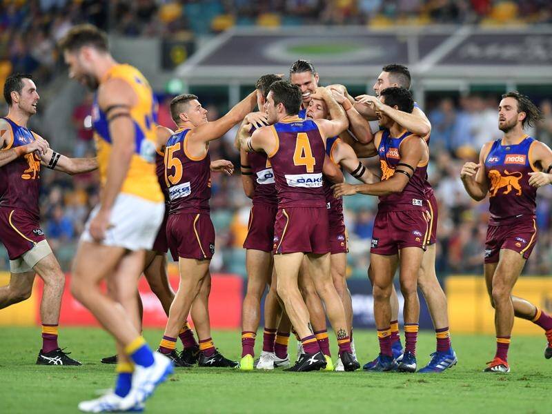 Brisbane have begun the new AFL season with victory over the premiers, West Coast.