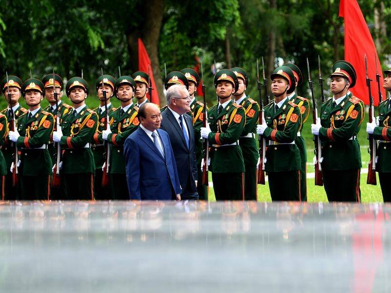 Prime Minister Scott Morrison has received a military welcome full of pomp and pageantry in Vietnam.