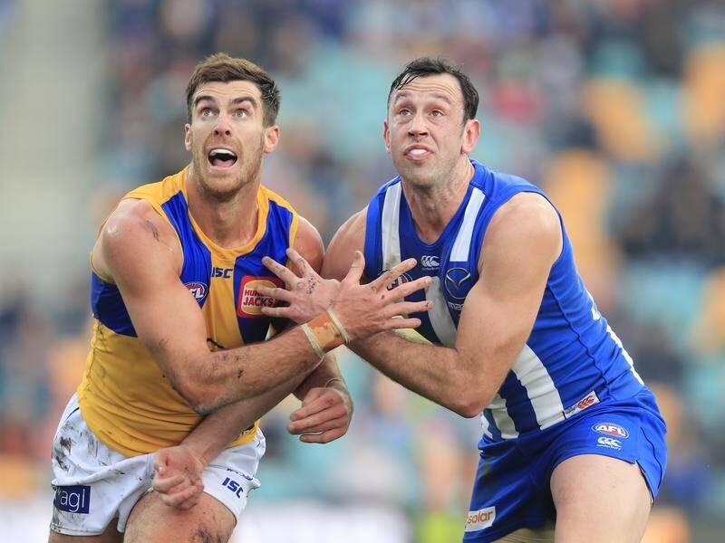 Todd Goldstein of the Kangaroos (R) dropped more than five kilograms in the AFL off-season.