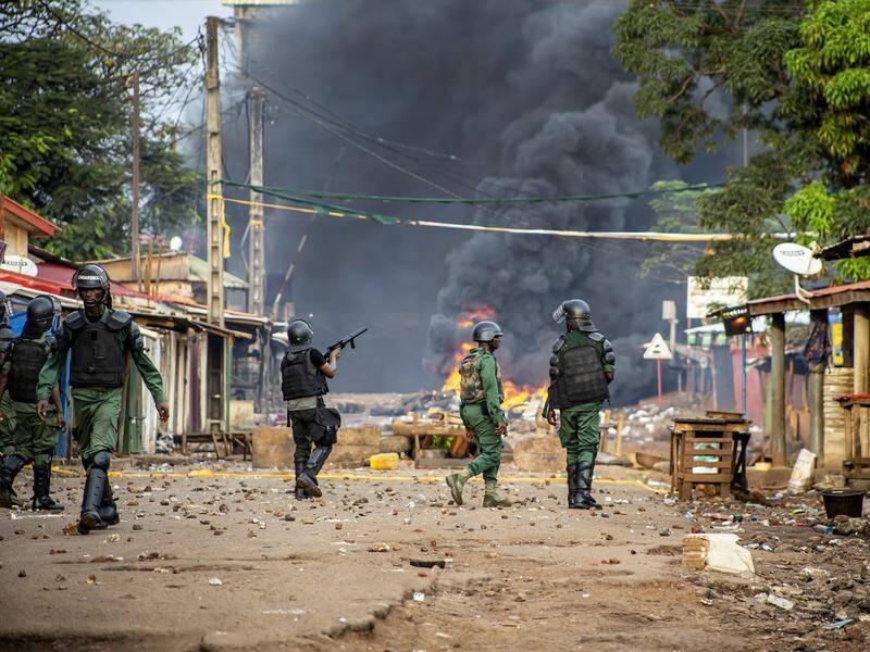 Violent clashes have erupted following voting Guinea's presidential election.