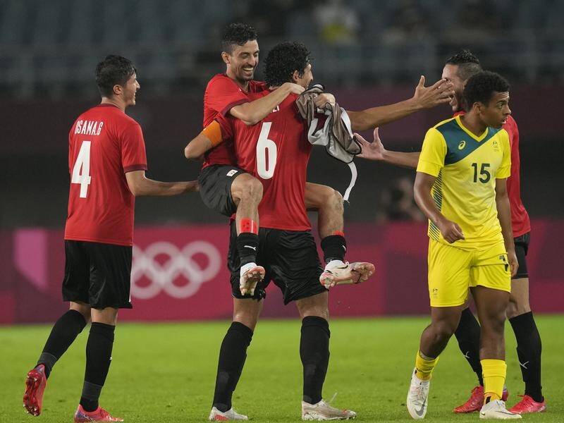 Egypt are celebrating a 2-0 soccer win that earned a last-eight berth and eliminated the Olyroos.