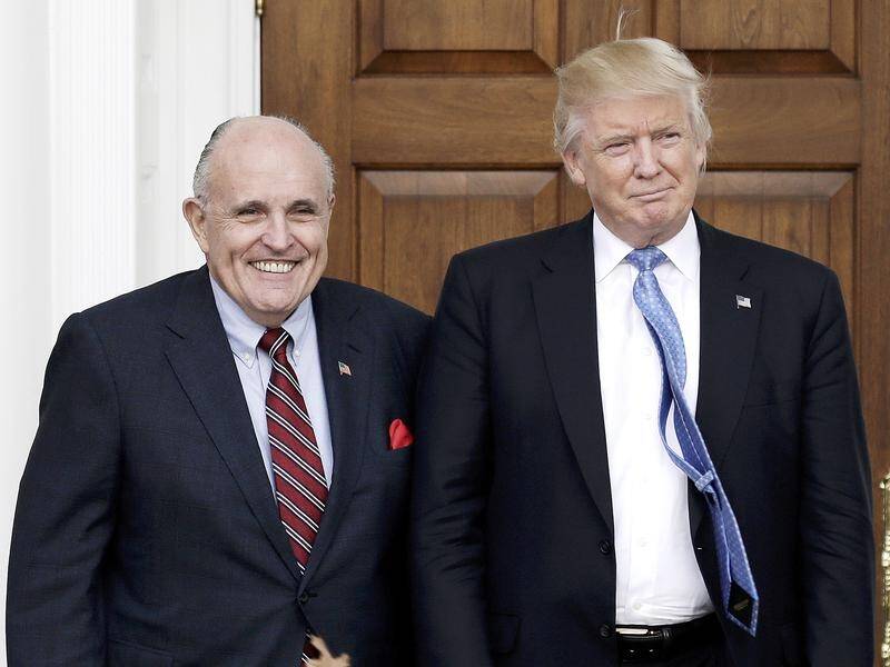US President Donald Trump says his lawyer Rudy Giuliani is the victim of a witch hunt.