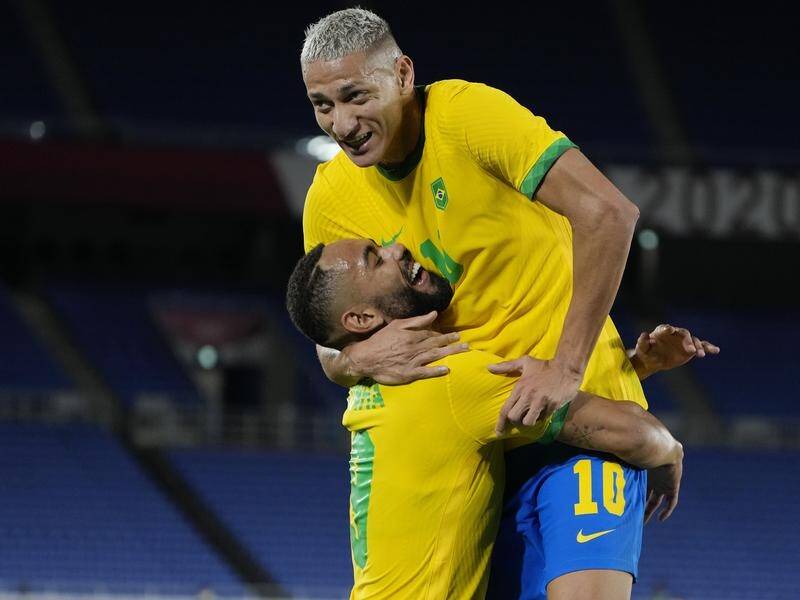 Brazil's Richarlison celebrates his hat-trick against Germany.