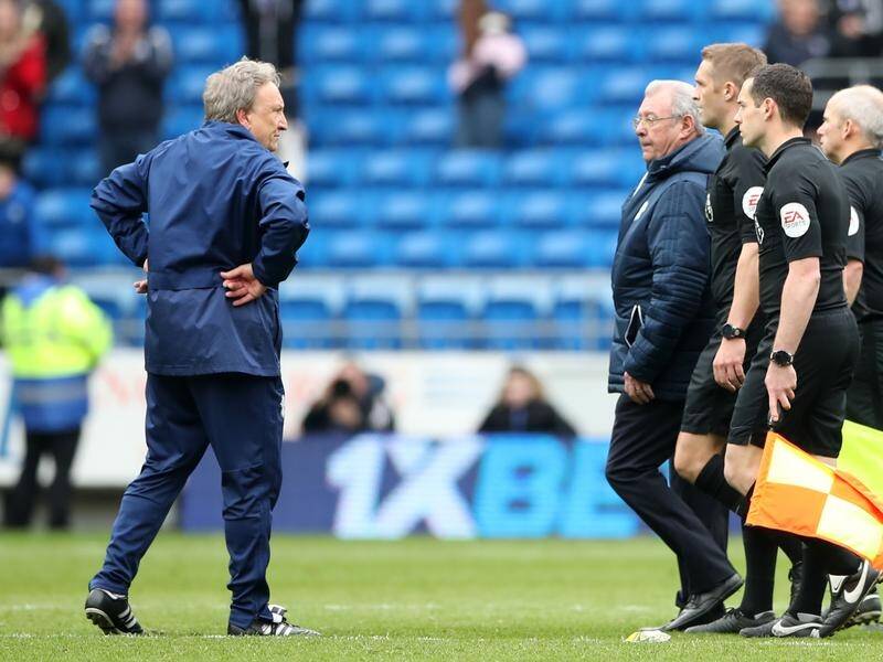 The FA has charged Cardiff manager Neil Warnock (L) over derogatory comments about EPL officials.