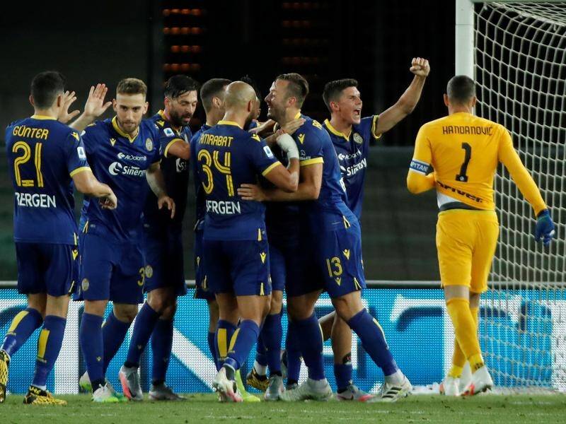 Verona celebrate a late goal in the 2-2 draw which stopped Inter Milan from going third in Serie A.