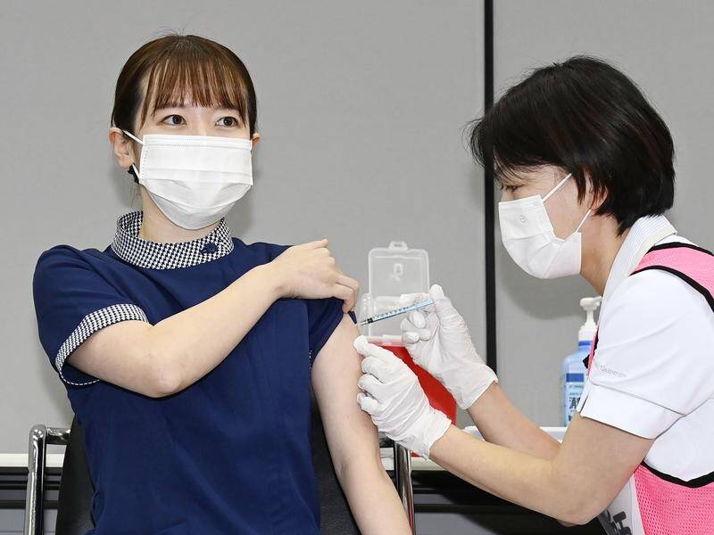 Measures including vaccines, masks and social distancing can be used to fight Omicron, the WHO says.