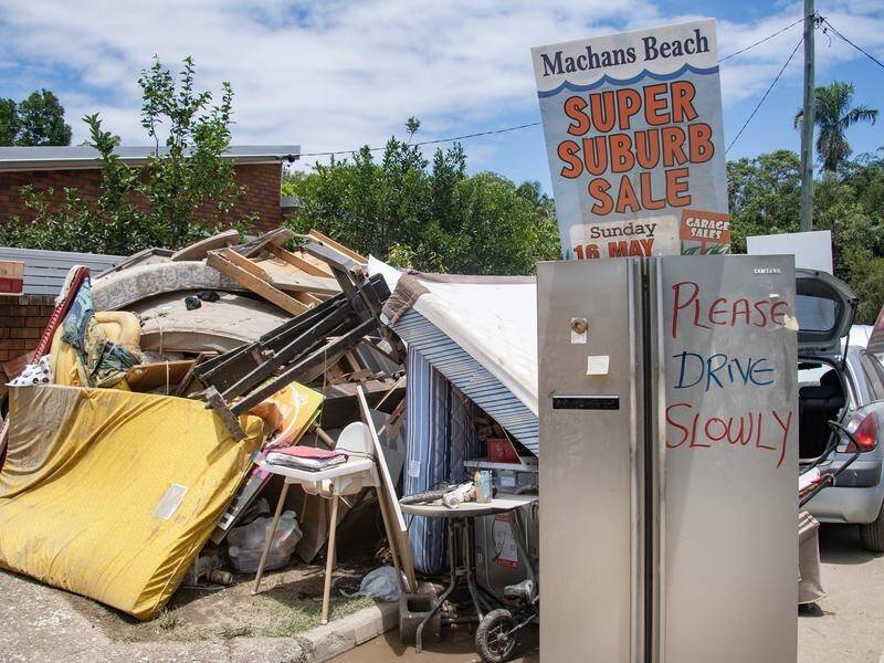 Uninsured flood victims in far north Queensland will be helped, the federal government says. (Brian Cassey/AAP PHOTOS)