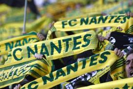 A fan of French club Nantes has died after being stabbed before a match with Nice. (AP PHOTO)