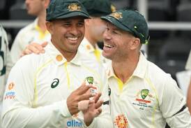 Usman Khawaja (L) insists fellow Test opener David Warner (R) has helped grow cricket in Australia. (Dave Hunt/AAP PHOTOS)
