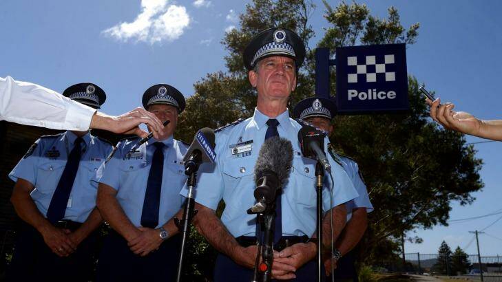 Police Commissioner Andrew Scipione, centre, addresses the media on the death of Sergeant Geoffrey Richardson. Photo: Jonathan Carroll