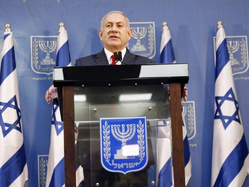 Benjamin Netanyahu has taken on the defence portfolio and rejected calls to dissolve his government.