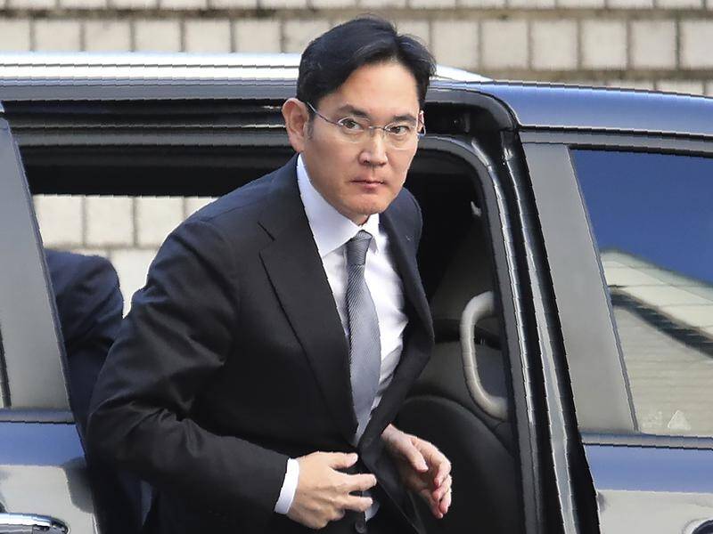 Jay Y Lee welcomed the pardon and vowed to work hard for South Korea's economy. (AP PHOTO)