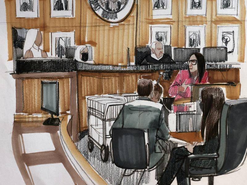 In this courtroom sketch, 'Jane' (l) testifies in the child pornography trial of singer R. Kelly. (AP PHOTO)