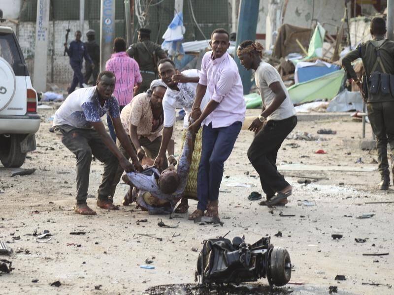 Police say 39 people died in an attack by suicide bombers and gunmen at a Mogadishu hotel.