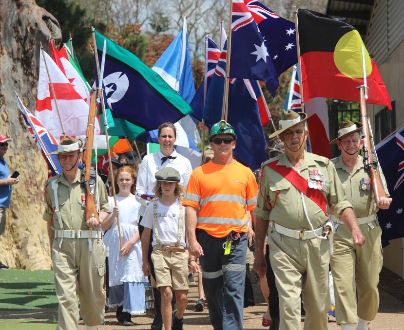 REMEMBRANCE: Kurri Kurri came out in force for the Centenary of Armistice street parade on Friday. Picture: Stephen Bisset