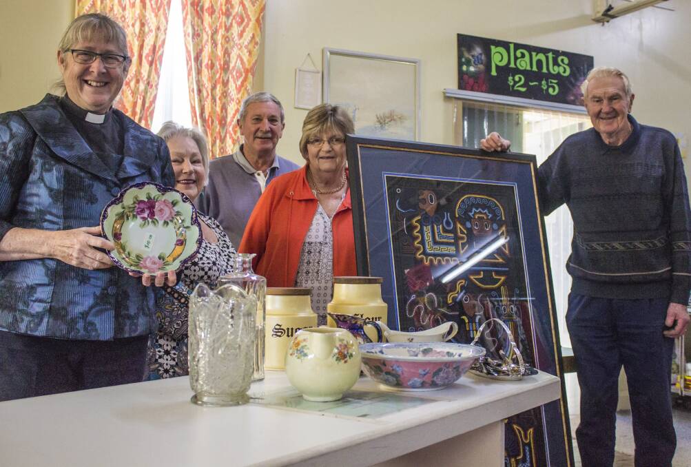 BIG HEARTS: Mother Theresa Angert-Quilter with volunteers from St Mary's Anglican Op Shop, Weston. Photo: Stephen Bisset