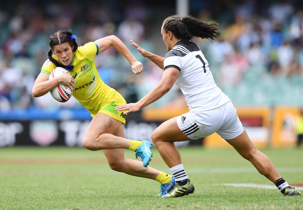 ON THE BALL: Charlotte Caslick (l) will be one of the Australian Women's Sevens rugby starts to visit Nulkaba next week. Picture AAP