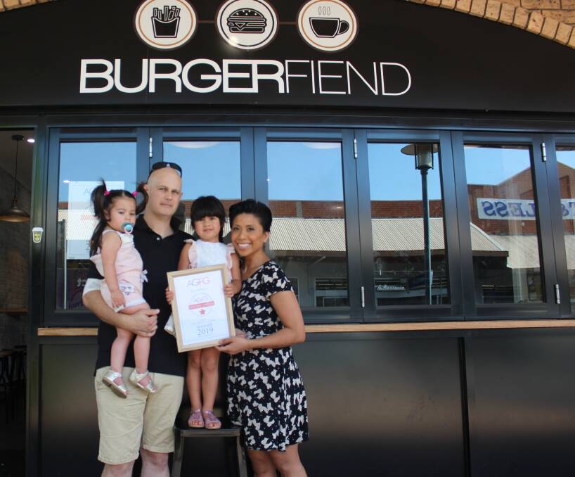 SWEET TASTE OF SUCCESS: Burgerfiend's Matt and Marlene Fulham with their two children Morgan (left) and Juliet. Picture: Stephen Bisset