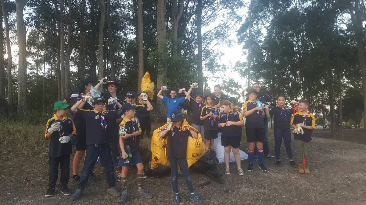 GOOD WORK: Members of Kurri Kurri Scout group with the fruits of their labours on Monday night.