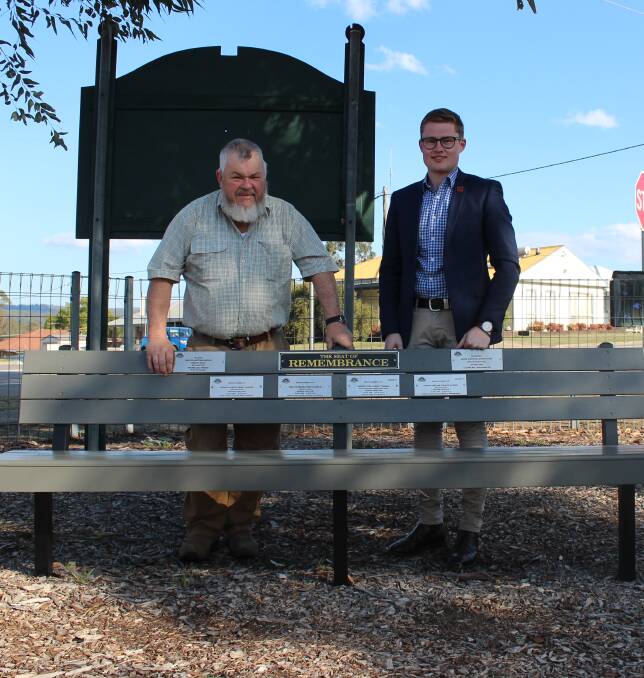 HONOURED: Kearsley Dawn Service Committee chairman Dale Goldie and member Jordan Fallon with some of the plaques unveiled last week.