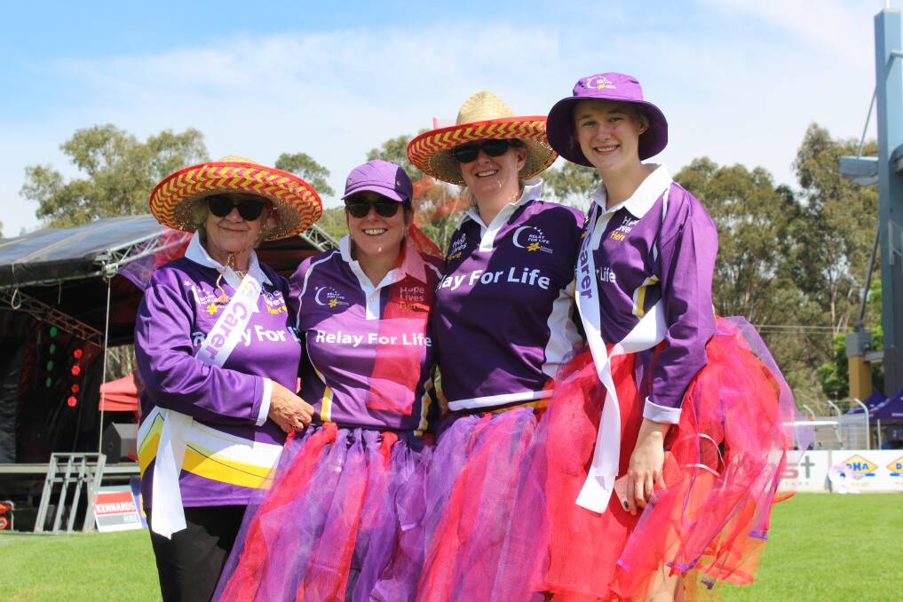 COLOURFUL:Sharon Jobbins, Kristen Edward, Lisa Robinson and Emily Whips at the 2018 Cessnock Relay For Life at Baddeley Park. Picture: Stephen Bisset