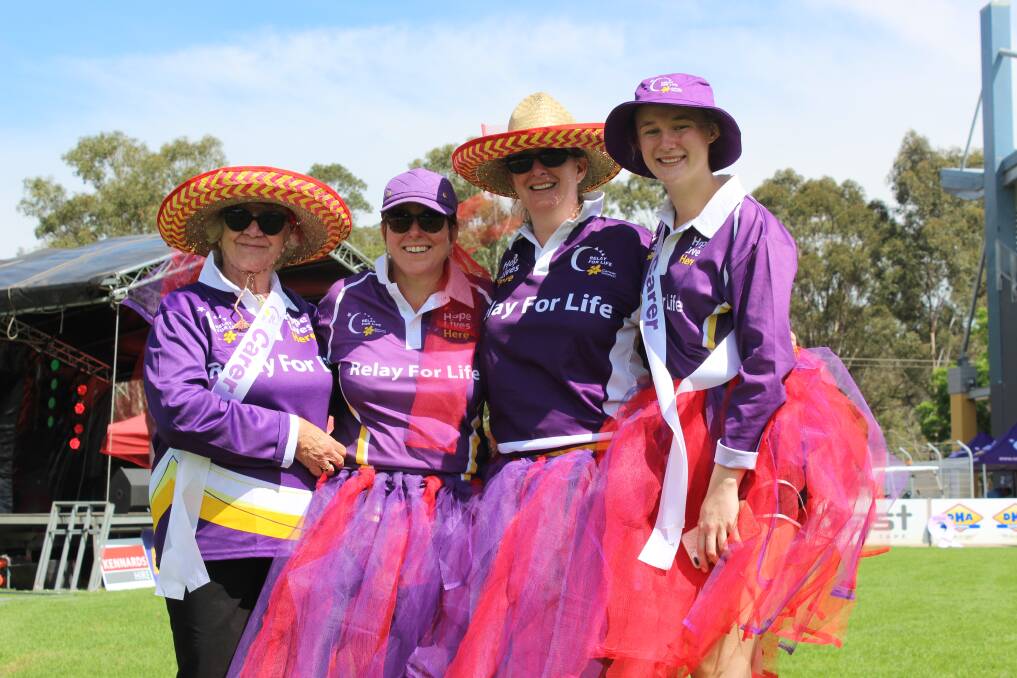 ALL SMILES: Sharon Jobbins, Kristen Edward, Lisa Robinson and Emily Whips at Cessnock Relay For Life. Picture: Stephen Bisset