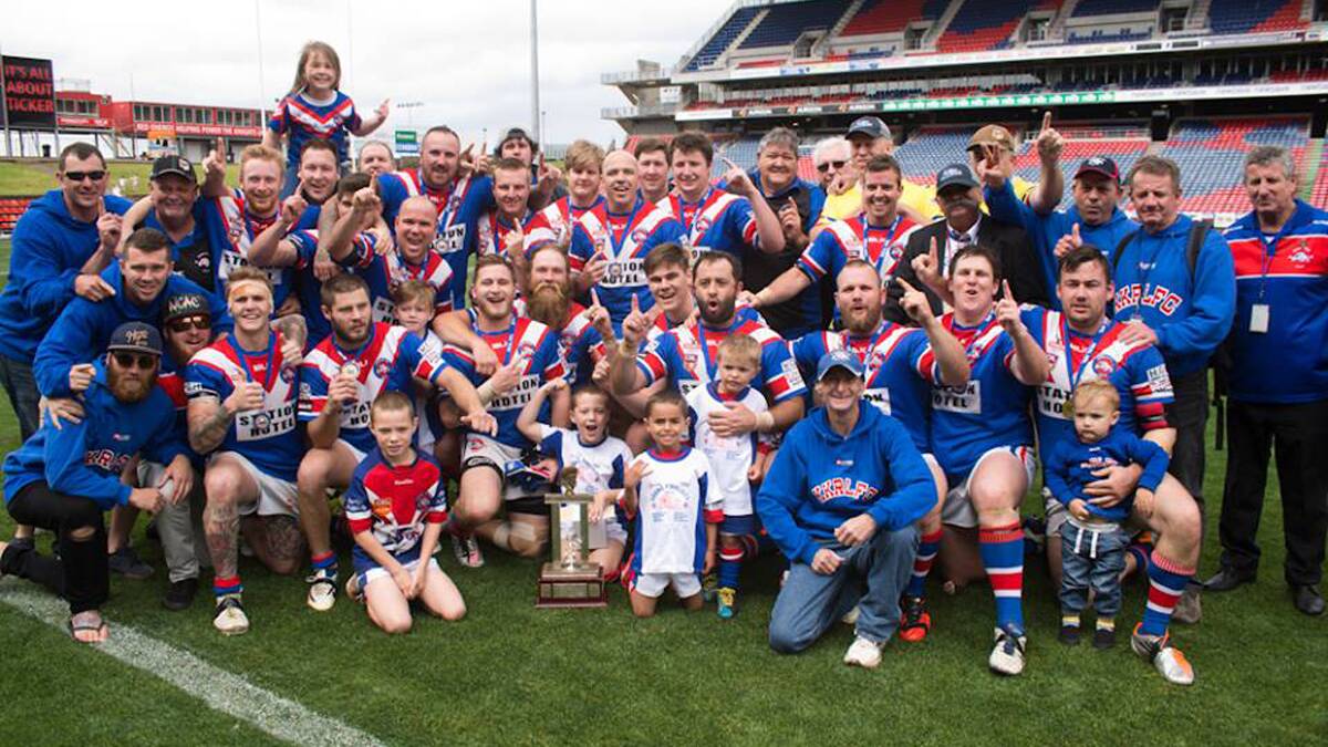 VICTORY: The Kurri Bulldogs celebrate their Newcastle Rugby League open grade grand final win at Hunter Stadium on Sunday. Photo by 3L Photography.