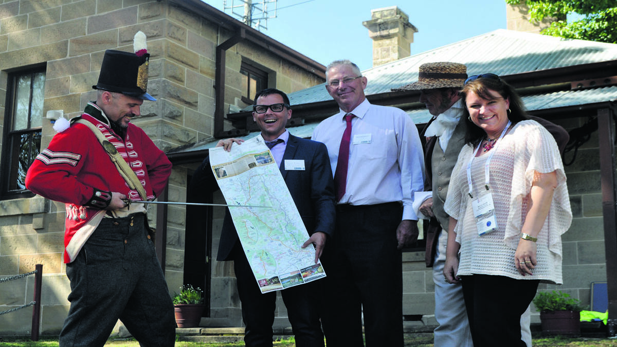 Pictured at the Great North Road Convict Trail Map launch in Wollombi is ‘Corporal Punishment’ from Convict Footprints; Assistant Secretary from Program Delivery and Support, Gregory Andrews; Cessnock Mayor Bob Pynsent; ‘Sir Major Thomas Mitchell’ and CEO of the Convict Trail Project, Lori Modde. 