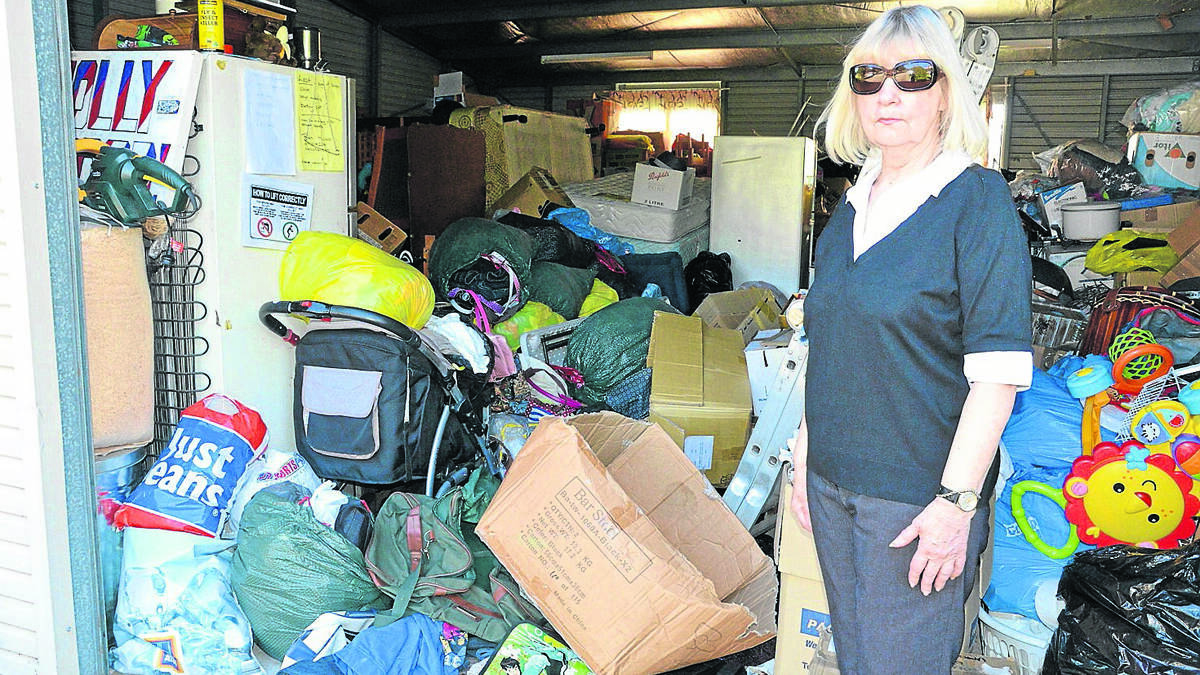 TRASHED: Hunter Domestic Violence Support and Advisory Services coordinator Paula Mudd at the charity’s Branxton intake centre shed, which volunteers discovered broken into on Tuesday morning.