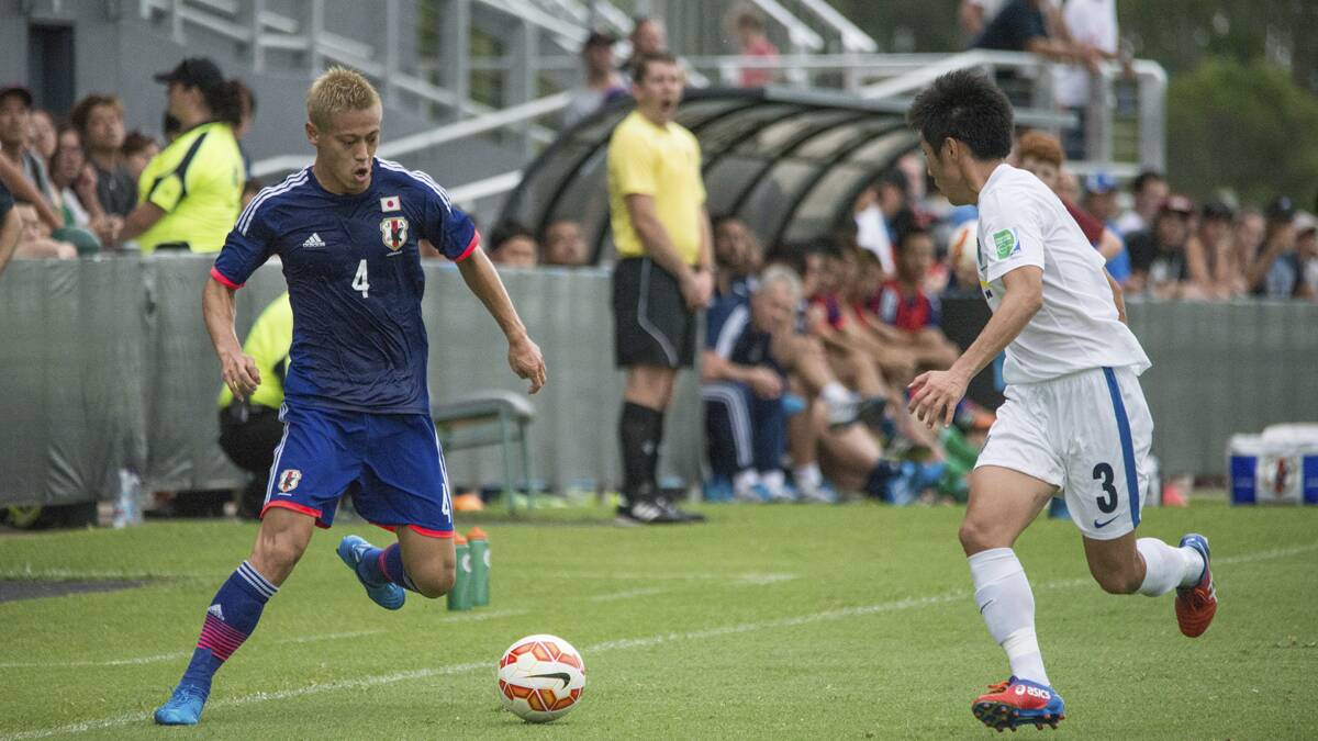 CROWD-PLEASER: Japanese star Keisuke Honda in action at Cessnock Sportsground on Sunday. Photo by Rachelle Corcoran, RPM Images.