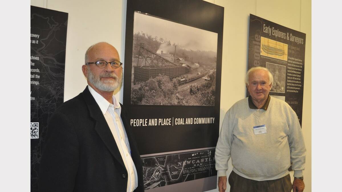 HISTORY: Cessnock Regional Art Gallery director John Barnes and Coalfield Heritage Group secretary Brian Andrews OAM at the opening of ‘People and Place - Coal and Community’ on Saturday.