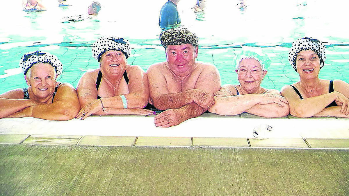 UP FOR THE CHALLENGE: The ‘Aquaducks’ aqua aerobics class are looking forward to this YMCA Swimathon at Kurri Aquatic Centre this Sunday. Pictured from left is Margaret Ayrton, Vicki Johnson, Ross Farnham, Violet Minter and Colleen Hafey.