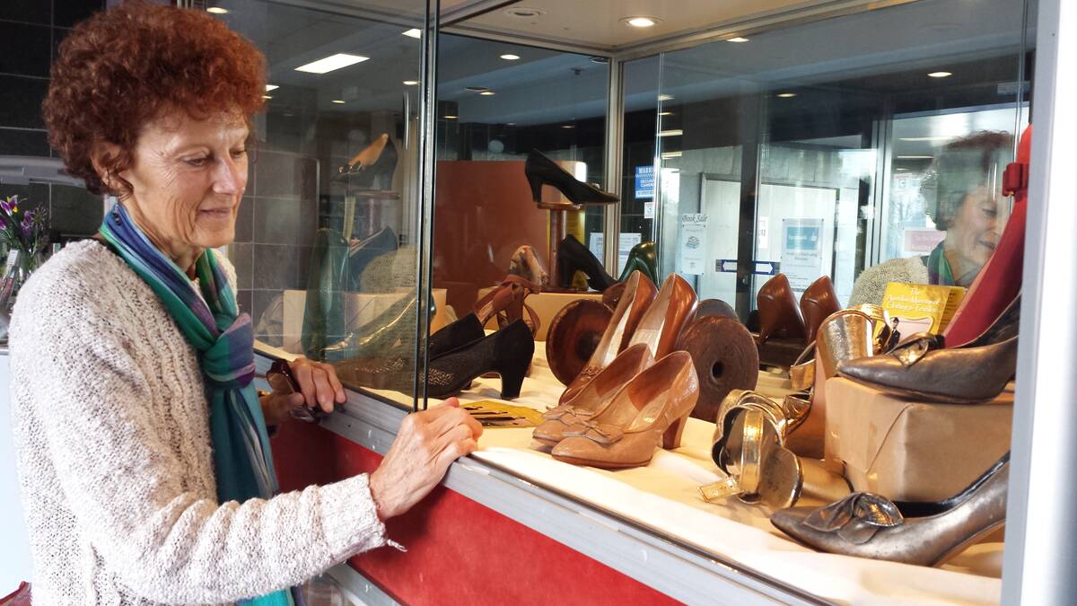 COLLECTION: Letitia Plume from the Australian Museum of Clothing and Textiles at the Kurri Library shoe display, which finishes this week.