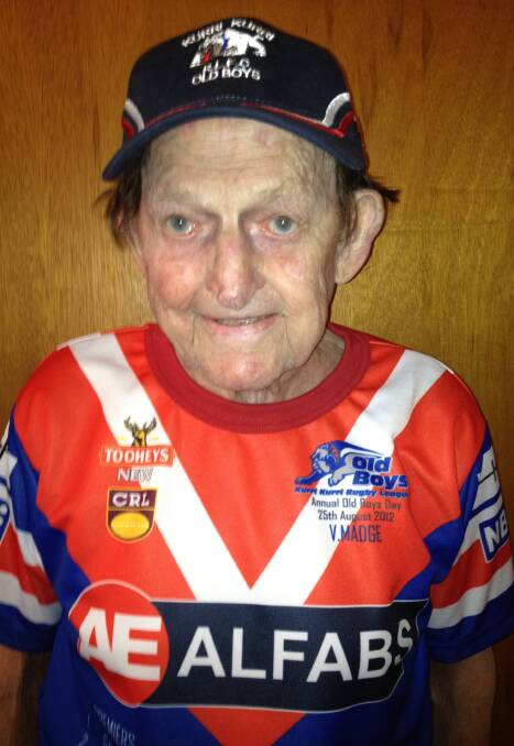 WILL BE MISSED: Kurri Bulldogs legend Viv Madge, pictured in a 1945 replica jersey in 2012, passed away on Friday aged 92. 