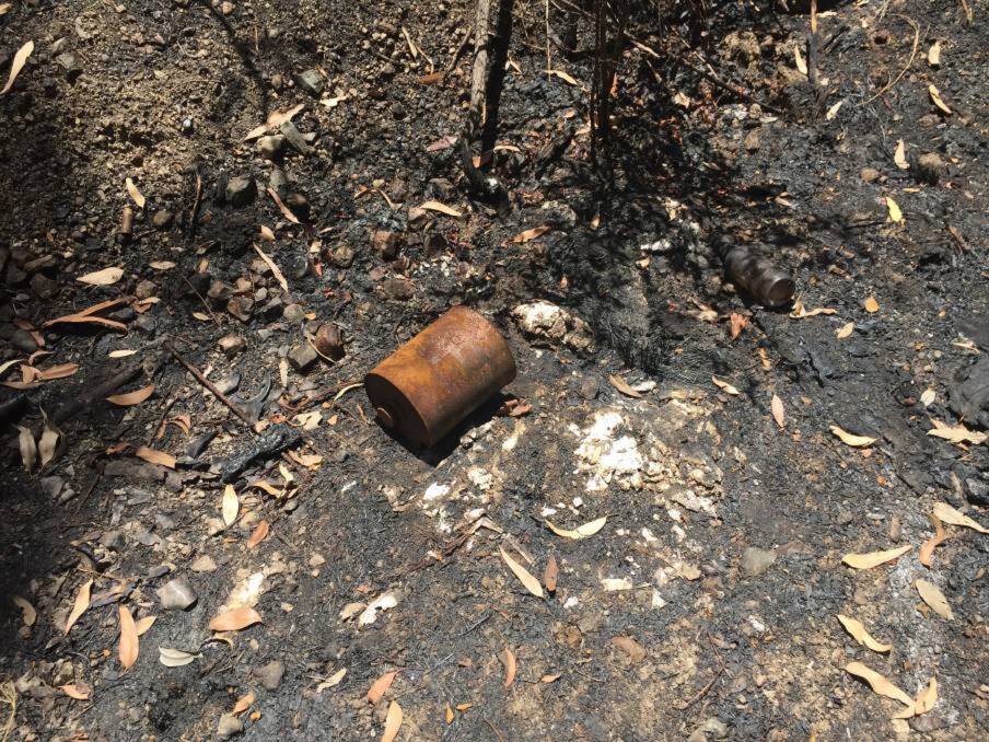 SCORCHED EARTH: One of the 22 points of ignition for a fire that was sparked in bushland west of Fassifern railway station on January 3. On Friday, Andrew Rodney John Merrick was jailed for lighting the fires. Picture: Sam Rigney 