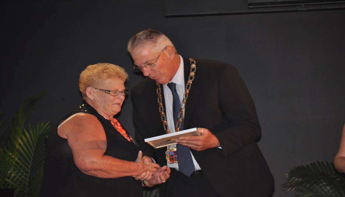 RECOGNITION: Cessnock City Citizen of the Year, Ellena Morris receives her Australia Day award from Cessnock mayor Bob Pynsent.