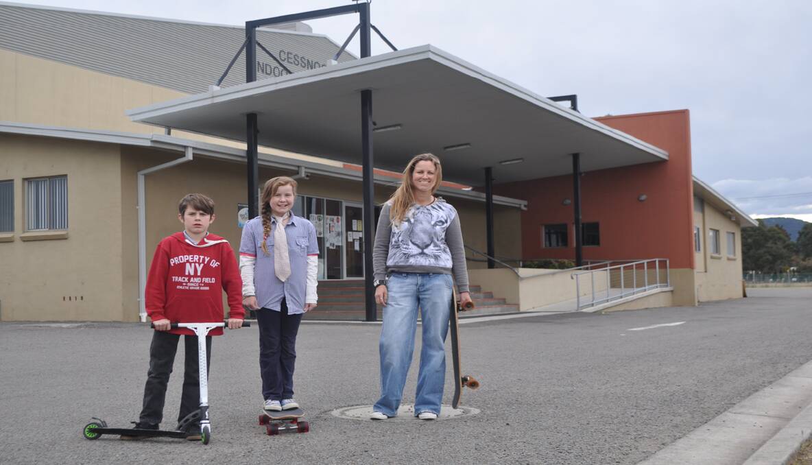 STOKED: Cr. Cordelia Troy with son Orlando and daughter Ocean, excited at the prospect of a new skate park in Cessnock. They are pictured at the Cessnock Civic Indoor Sports Centre, where land nearby will be investigated as a possible site.