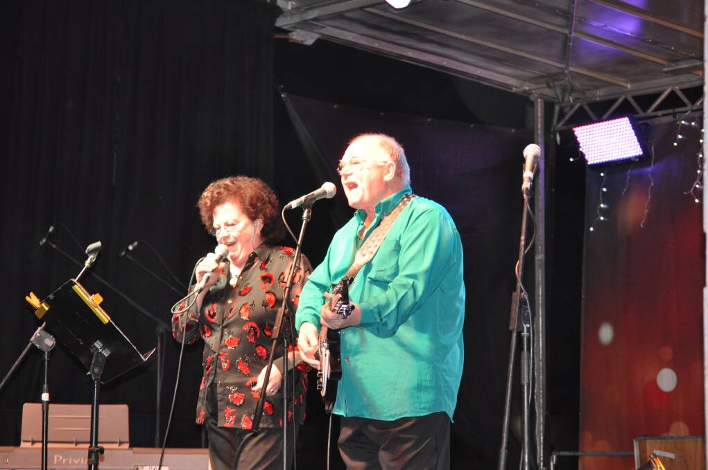Local duo Tucan (Pam and Les Gully) got the kids on their feet as always, at Carols in the Park, Cessnock TAFE grounds, December 6.