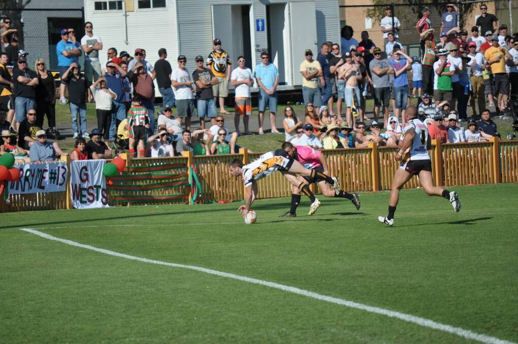 First-half action from the Newcastle Rugby League grand final. Cessnock winger Beau Ryan shows his agility to score the Goannas' first try.