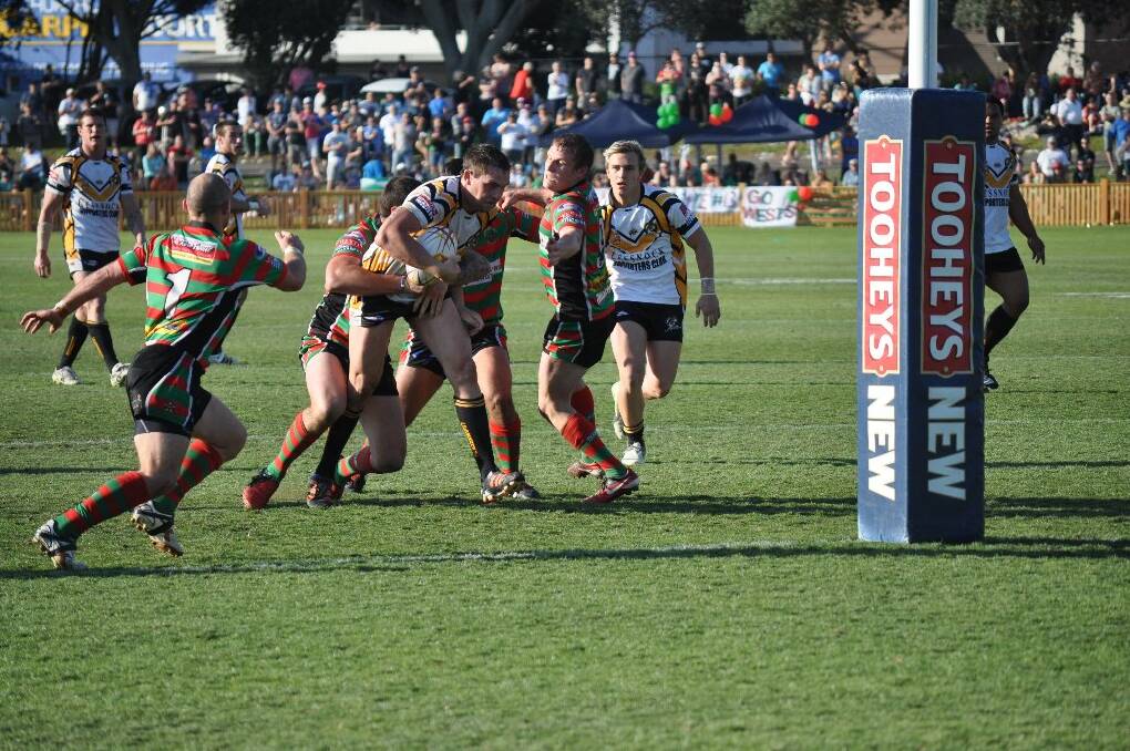 Second-half action from the Newcastle Rugby League grand final. Goannas lock Brendan Hlad makes a charge towards the tryline.