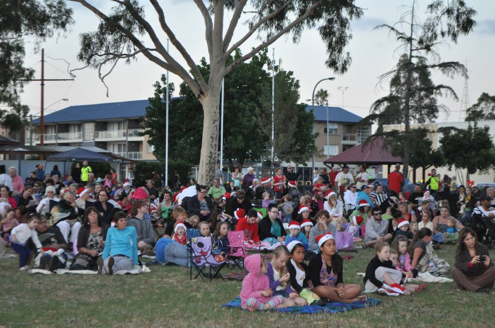 A section of the crowd at Carols in the Park, Cessnock TAFE grounds, December 6.